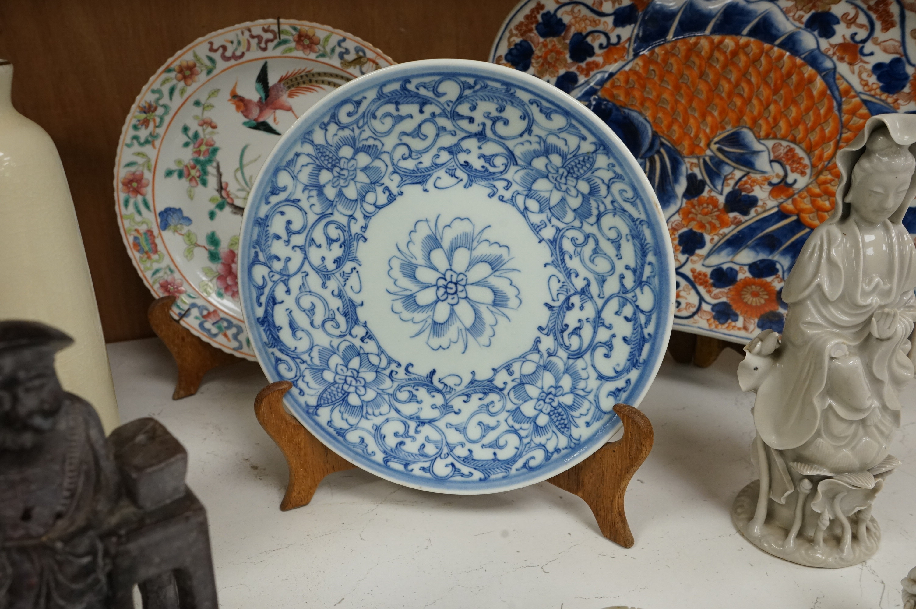 A large collection of various Chinese and Japanese ceramics and collectables to include a 19th century white glazed porcelain figure of Guanyin, largest 30.5cm